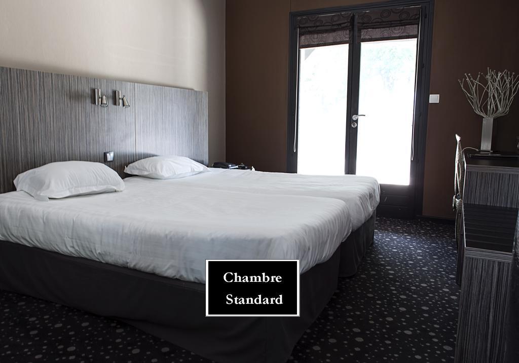 Hotel La Gentilhommiere Нюї-Сен-Жорж Номер фото